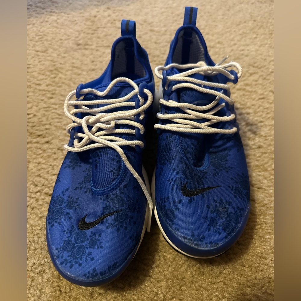 Nike Blue and White Athletic Shoes with Minimalist Design